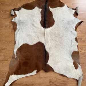 Brown and White Goat Hide Rug